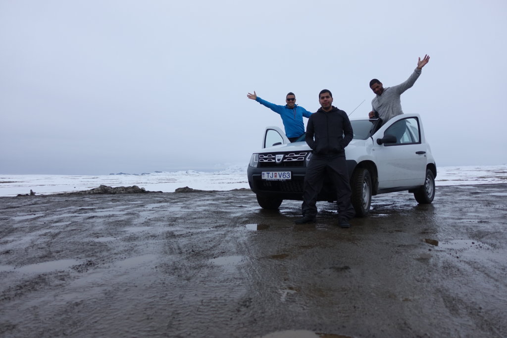 3 men and a white suv in Iceland