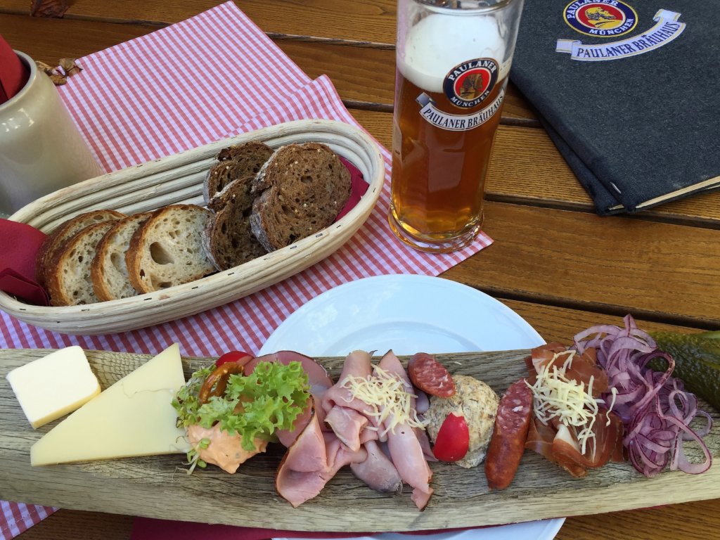 Meat and cheese platter and a beer