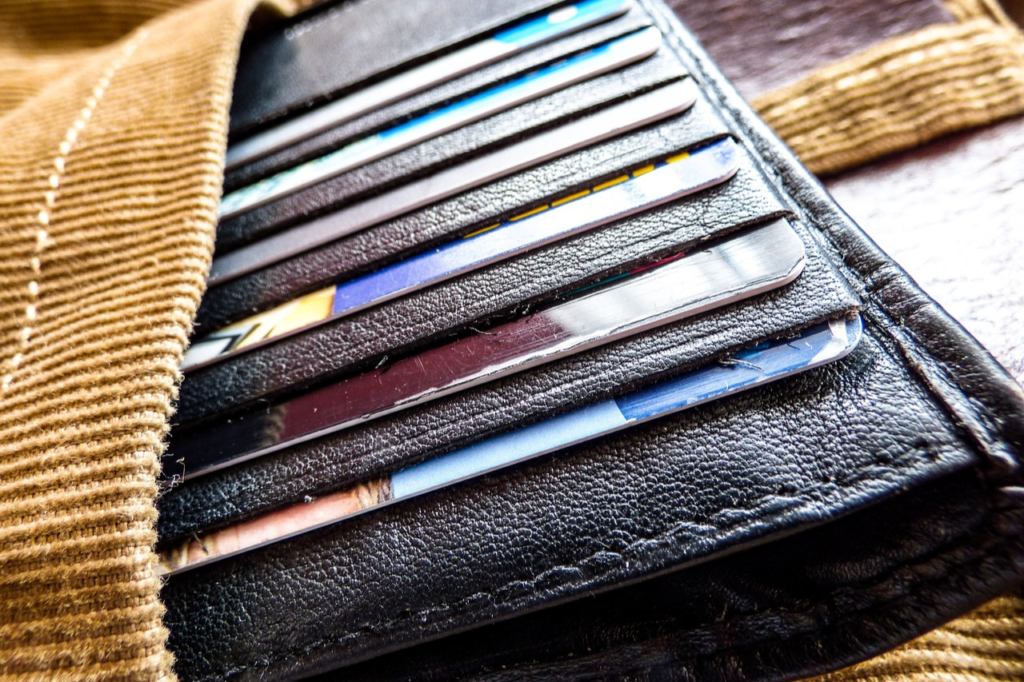 Brown wallet full of credit cards