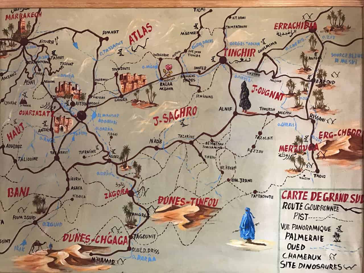 Hand-Painted Map of Southern Morocco and the Sahara Artistic map of southern Morocco highlighting desert regions, towns, dunes, and travel routes through the Atlas Mountains and Sahara Desert