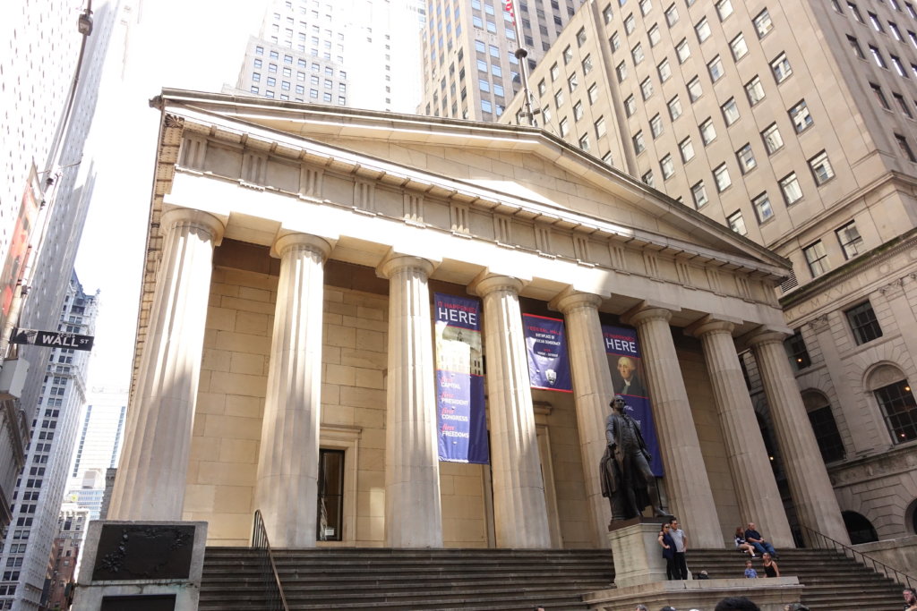 Federal Hall and George Washington statue as one of the buildings you will learn getting your nyc tour guide license