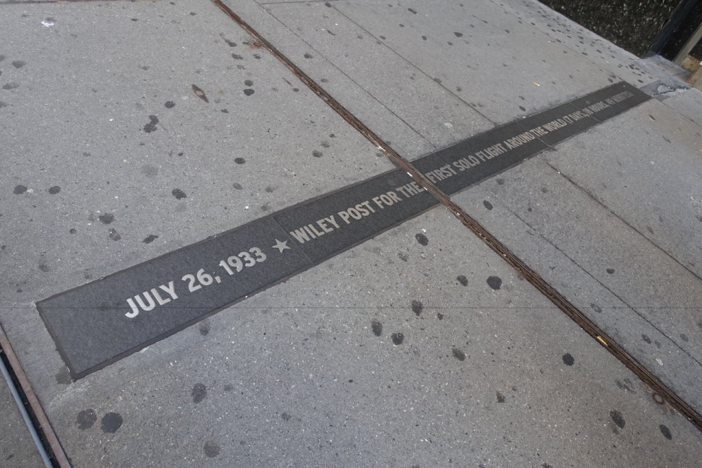 A plaque on the ground in NYC 