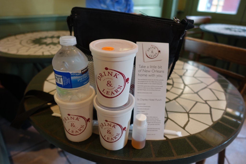 Cups with alcohol in a black cooler bag