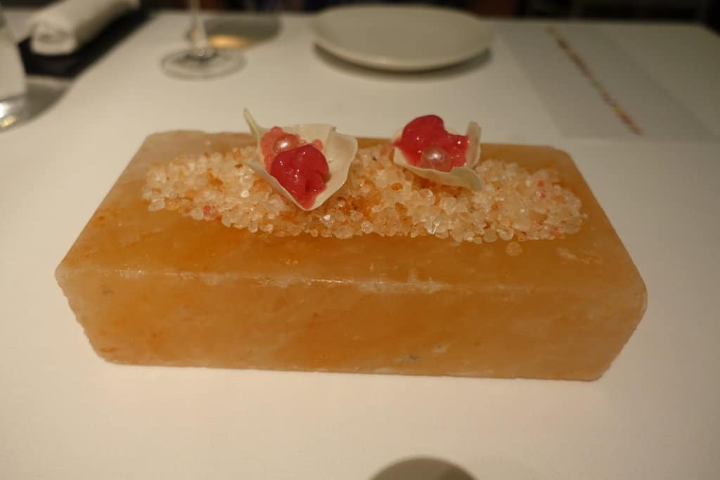 Small pink appetizers on a stone pink block