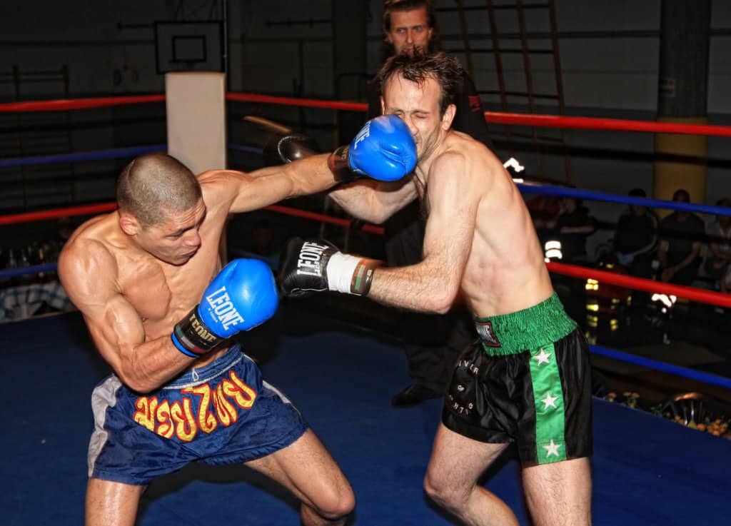 Two men boxing in Thailand as one of the Unique Nightlife Activities in Bangkok