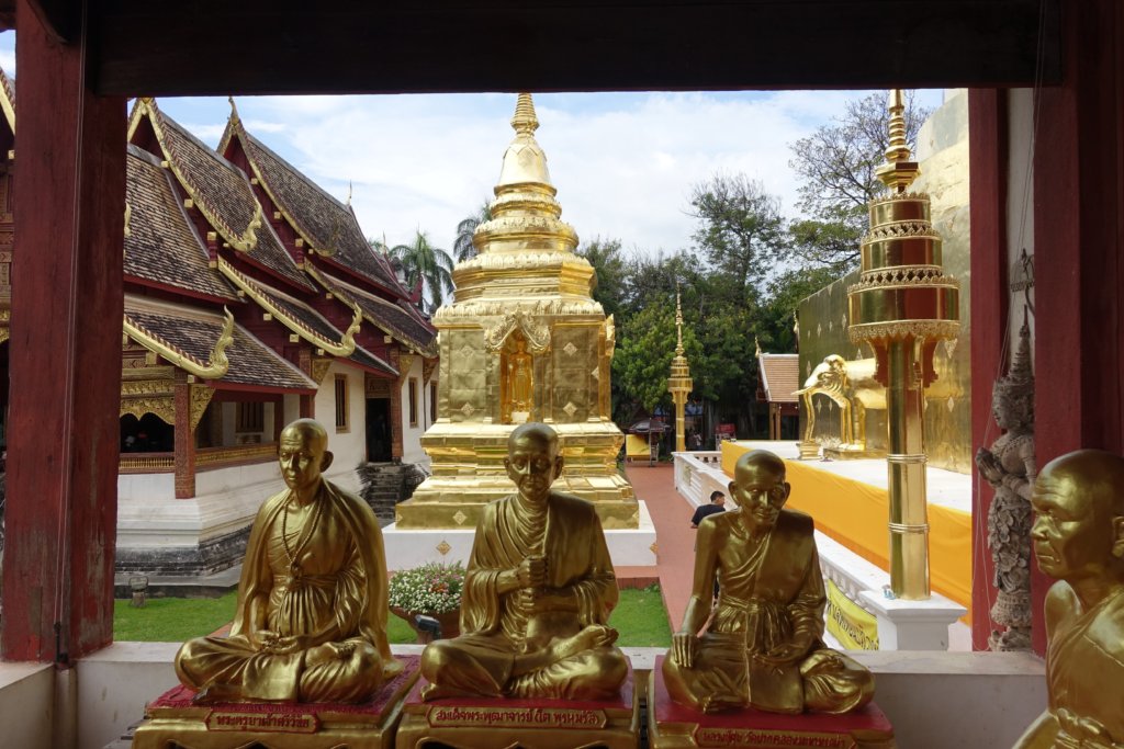 3 gold Buddhas and a temple in Chiang Mai