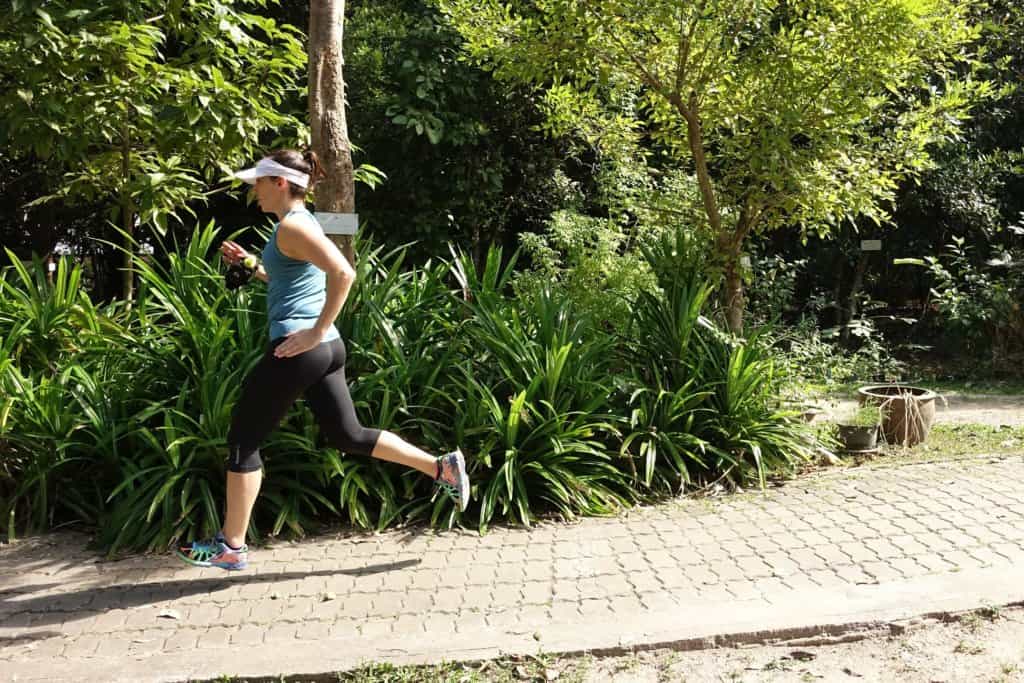 Gina running in garden to try to get fit without spending any money