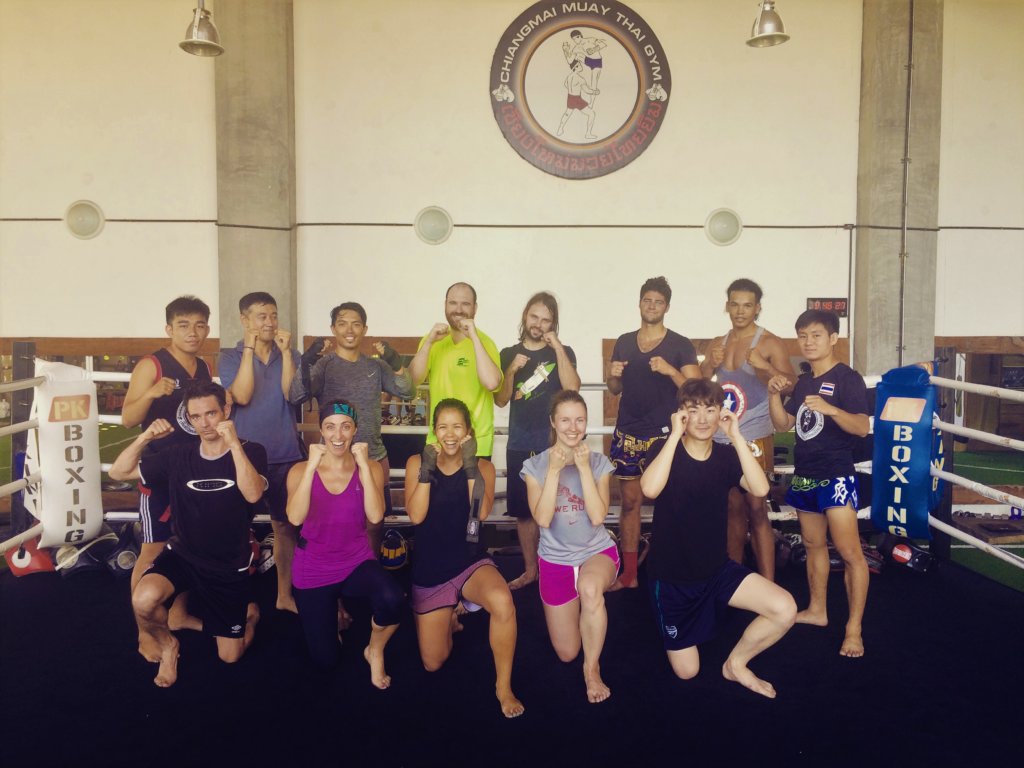 Group of people at a Muay Thai class