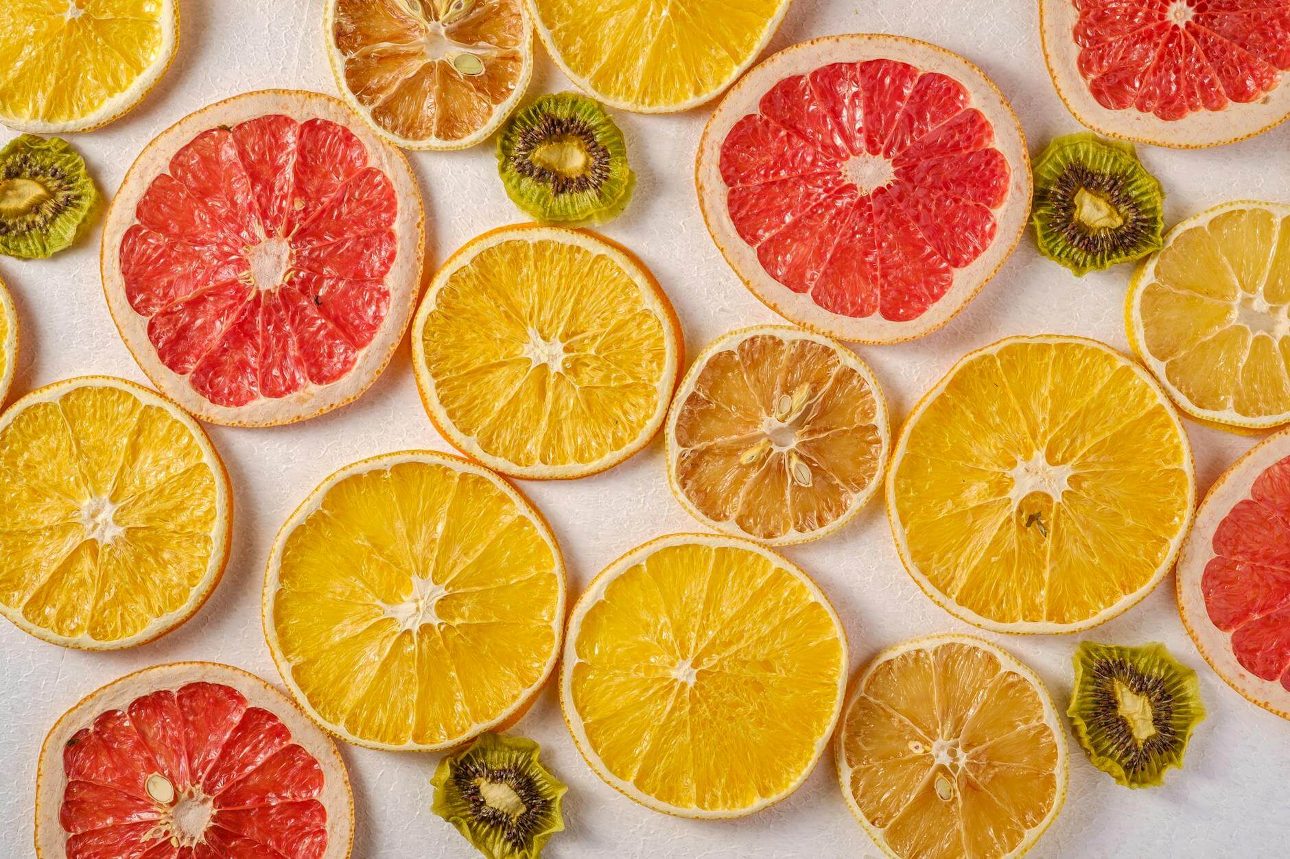 sliced oranges grapefruit and kiwi fruit