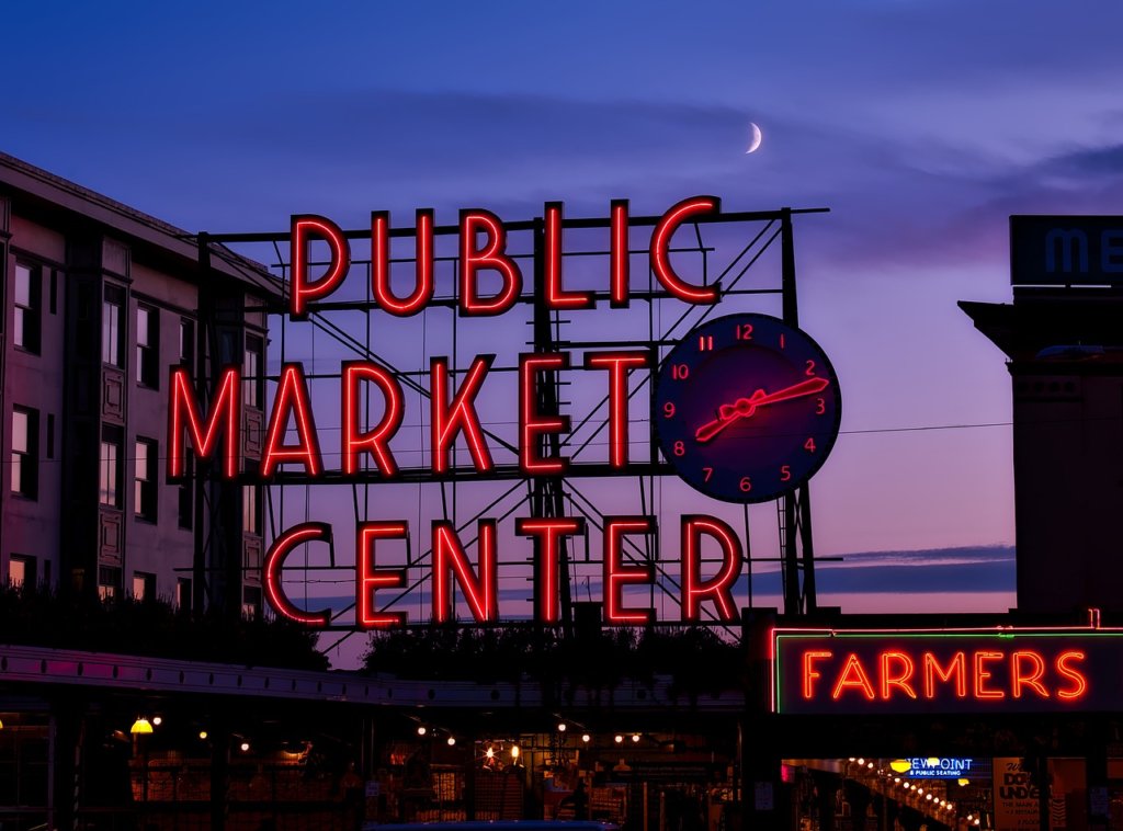 Nean sign with the words Public Market Center in Seattle