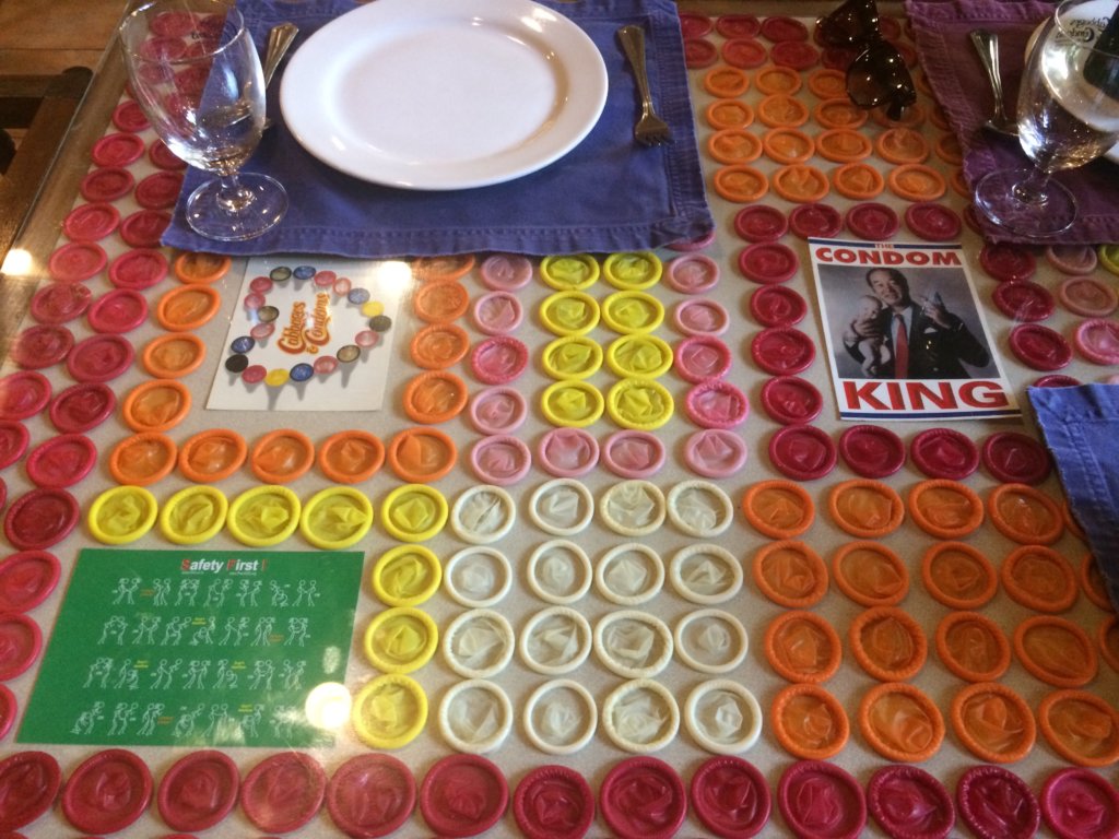 A table covered in condoms 