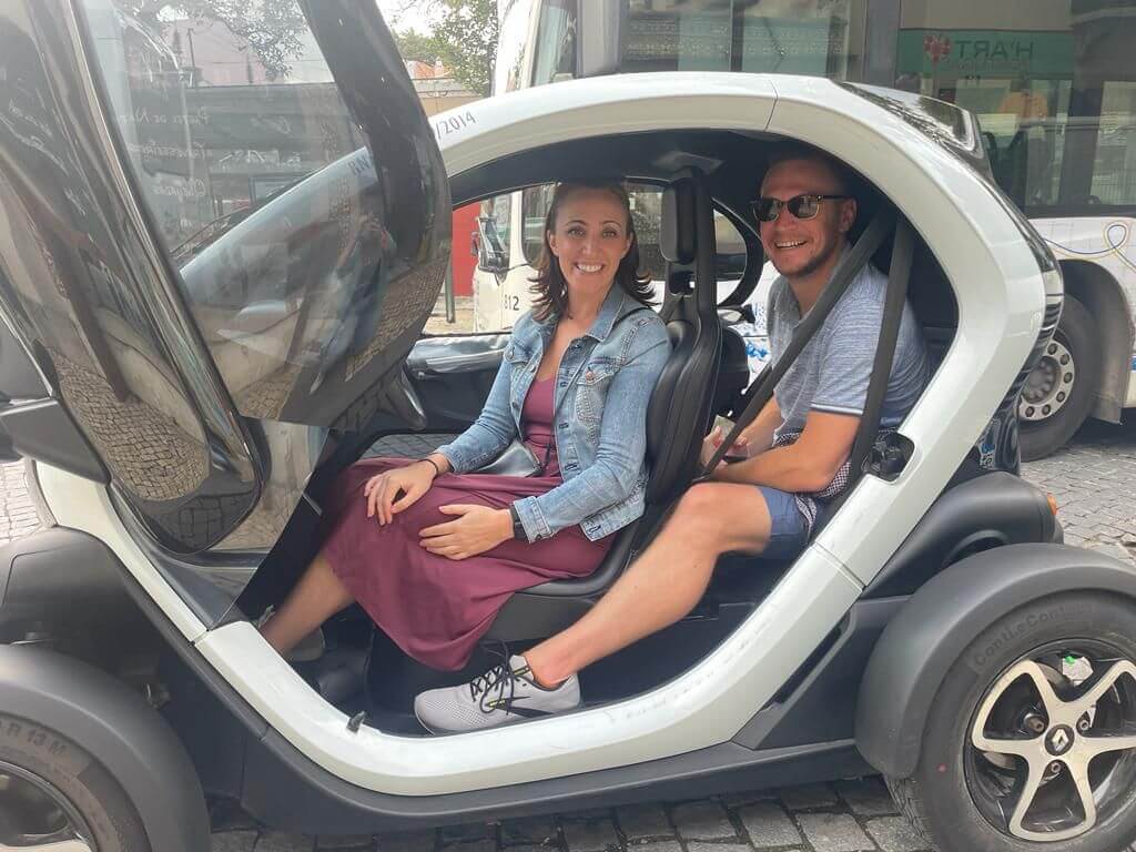 Gina and Logan in a small car in Sintra