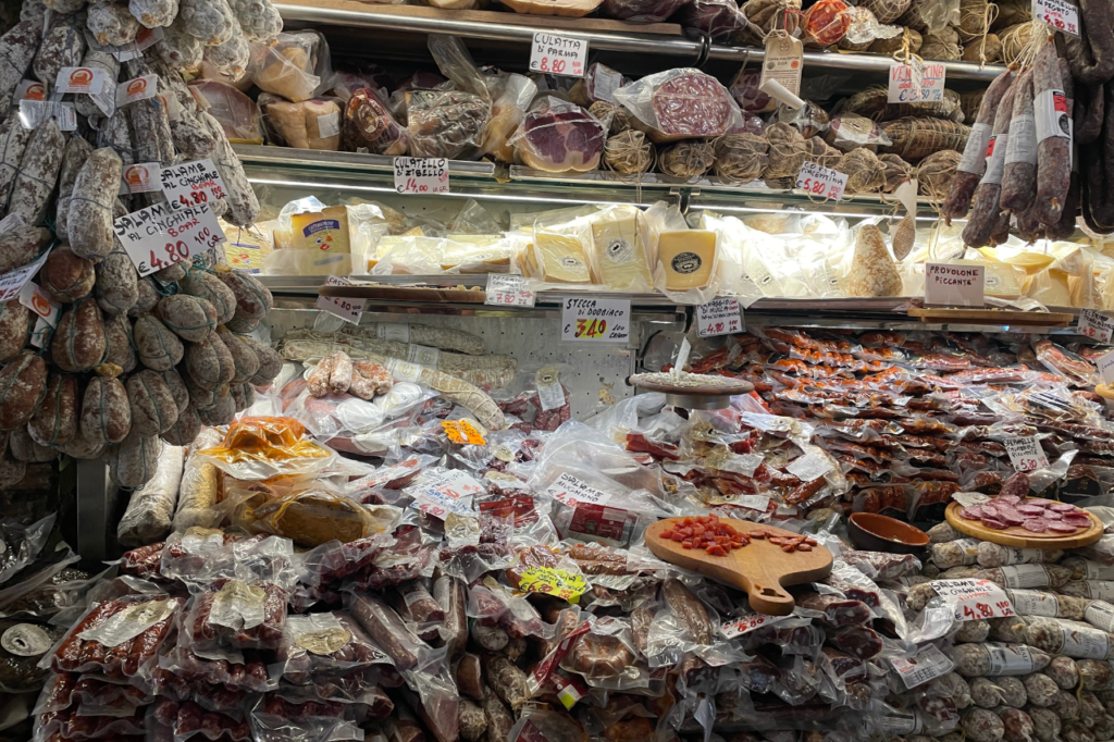 Meats and Cheeses in a deli counter 