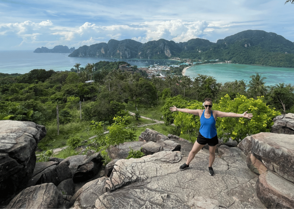 Gina standing above Koh Phi Phi no longer stuck in a rut and happy