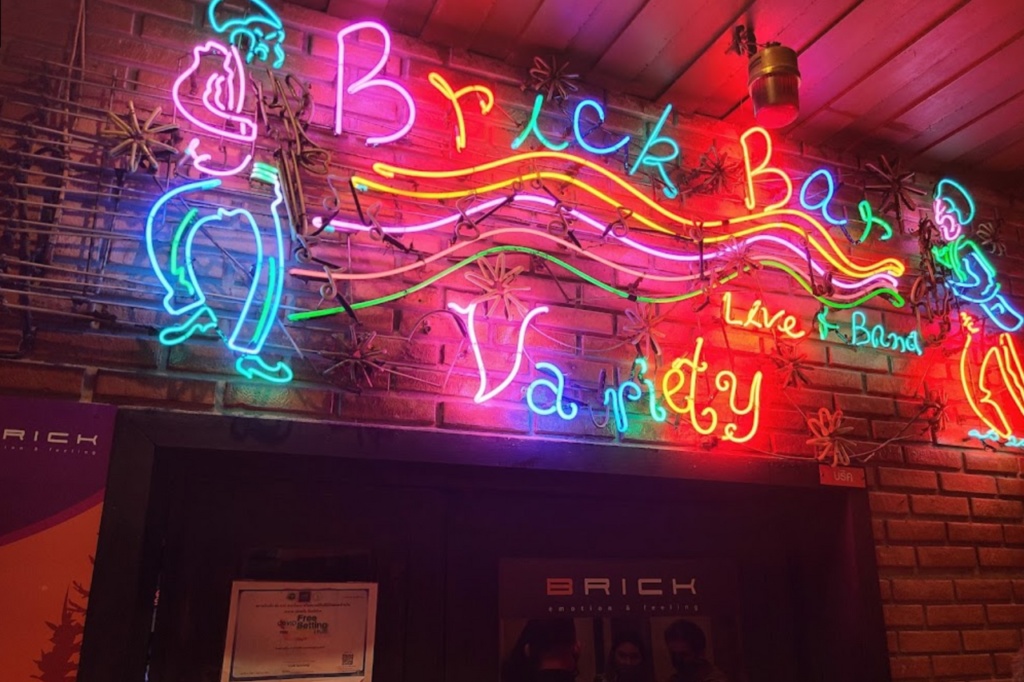 brick bar in neon lights