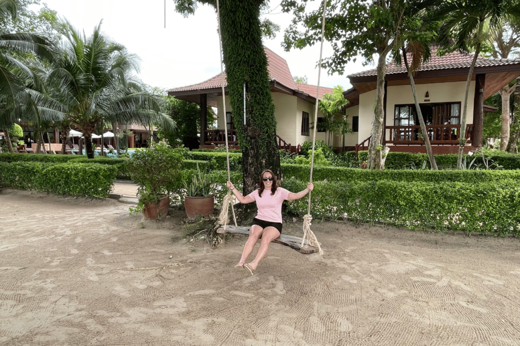 woman on a swing on thailand