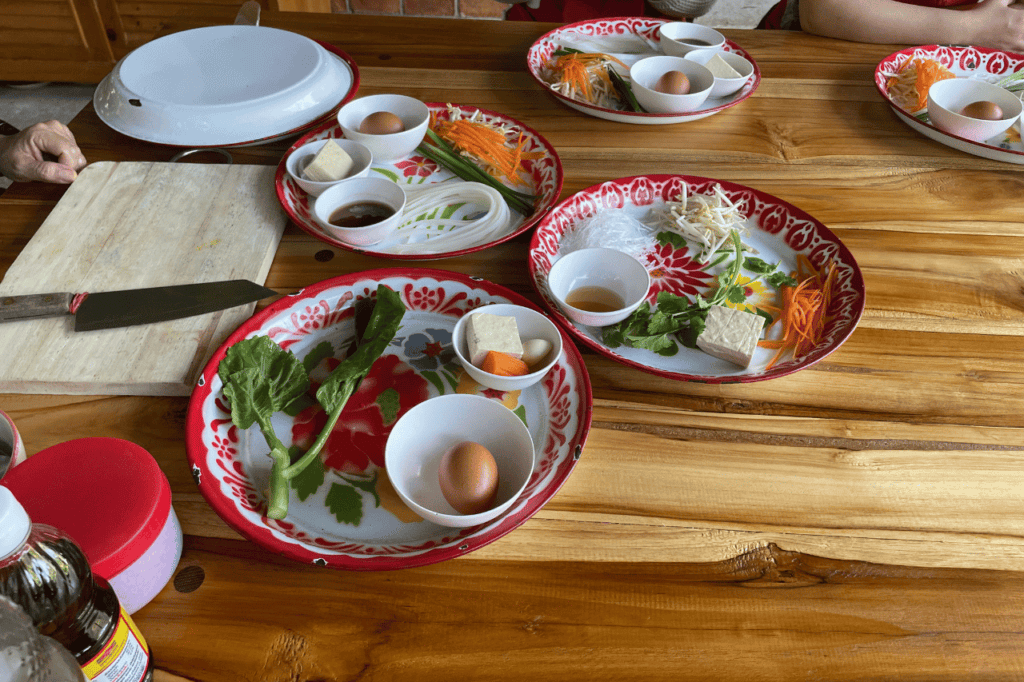 two plates of food during a cooking class on a 4 day bangkok itinerary 