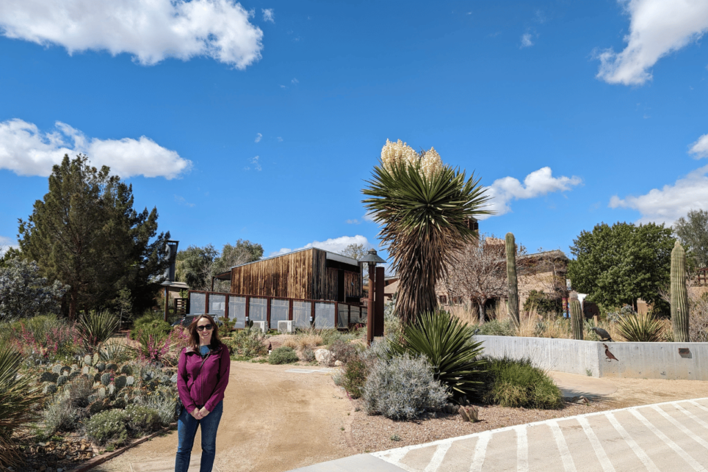 woman standing in front of the desert living center
