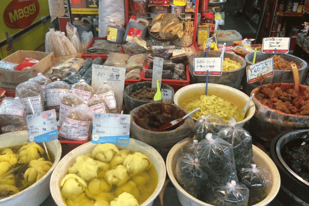 thai food at a night market in bowls