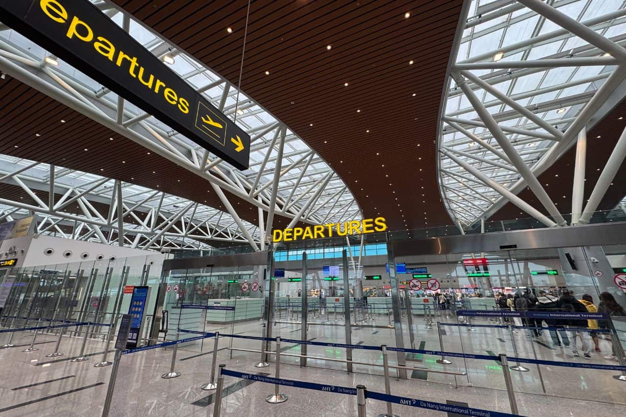 Boarding Gates and Lounges - Da Nang Airport Interior Wide view of boarding gate area with signs for Orchid and Lotus lounges at Da Nang Airport