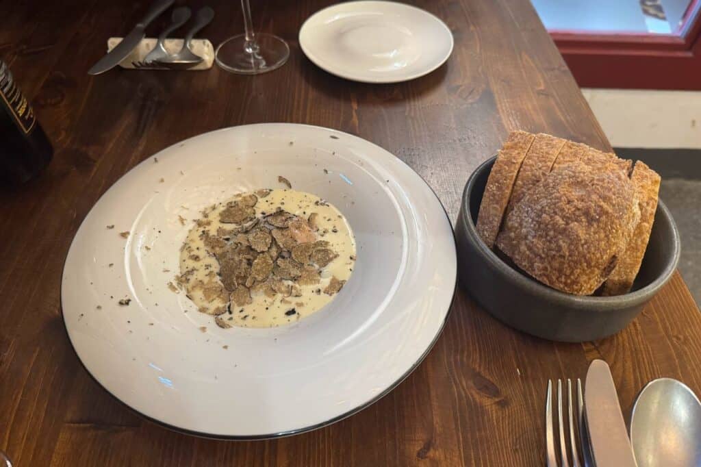 Delicious plate of truffle pasta served at a traditional restaurant in Lucca Italy