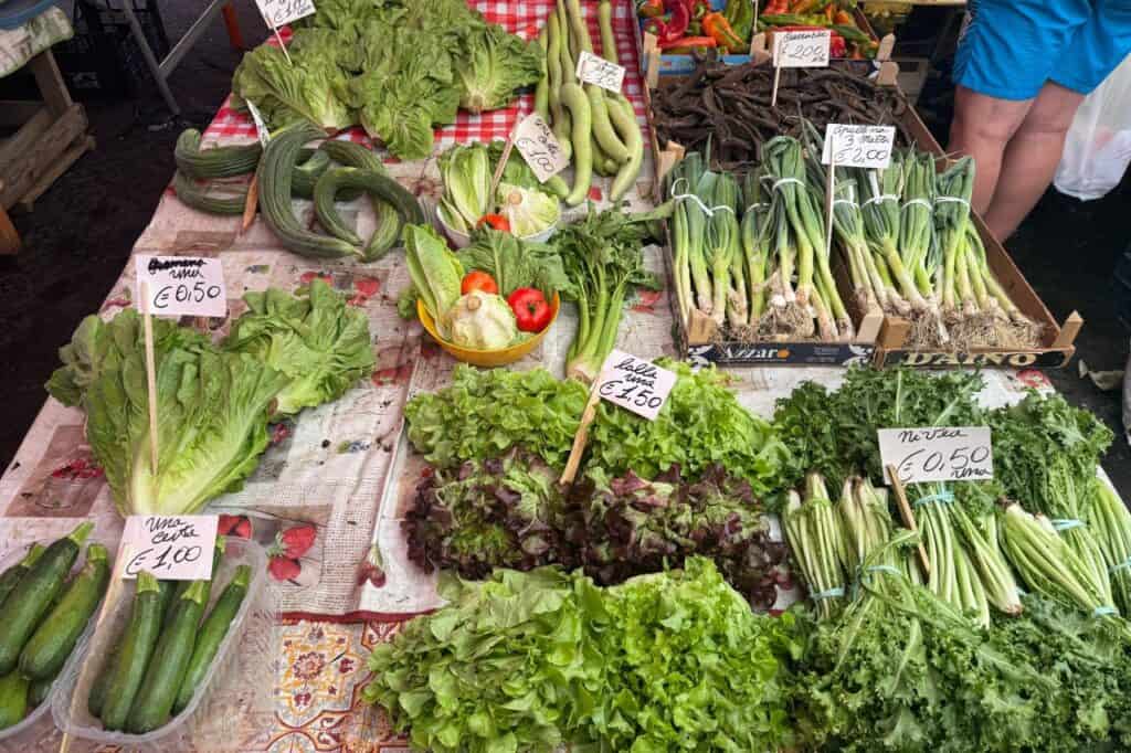 Explore Catania’s colorful markets filled with fresh fruits, vegetables, and Sicilian specialties.