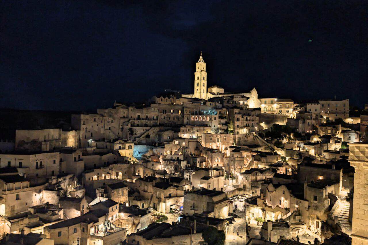 Panoramic night view of Matera in italy 