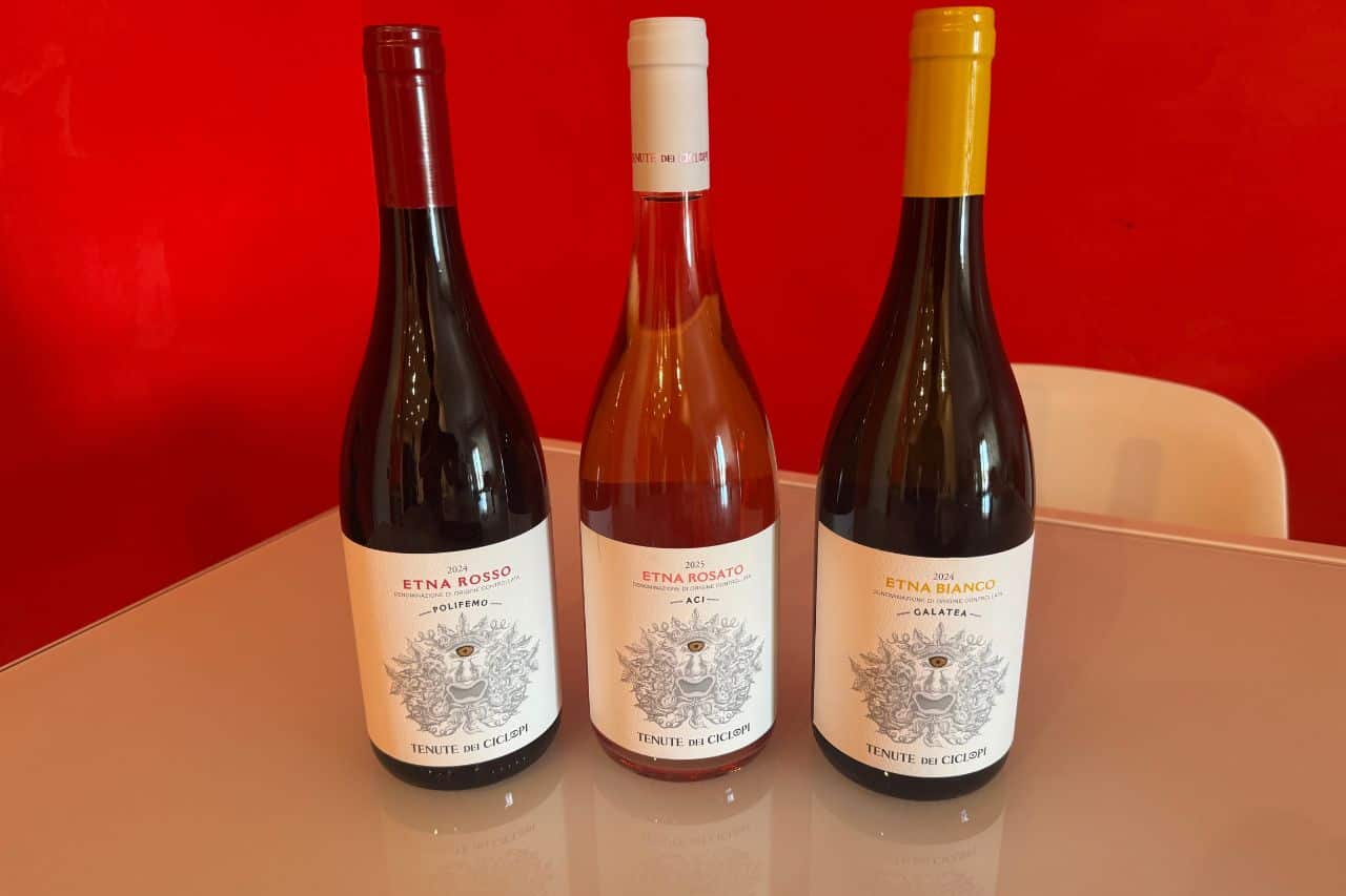 Bottles of Etna Rosso, Etna Rosato, and Etna Bianco wines from Tenute dei Ciclopi in Catania, Sicily.